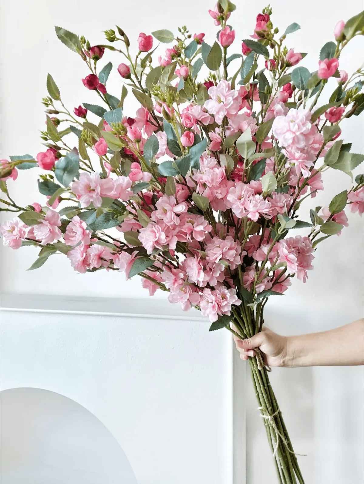 Artificial Pomegranate Branches in White Vase