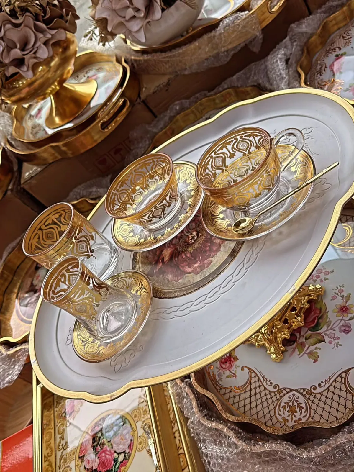 Gold Ornamented Glass Cup and Saucer Set