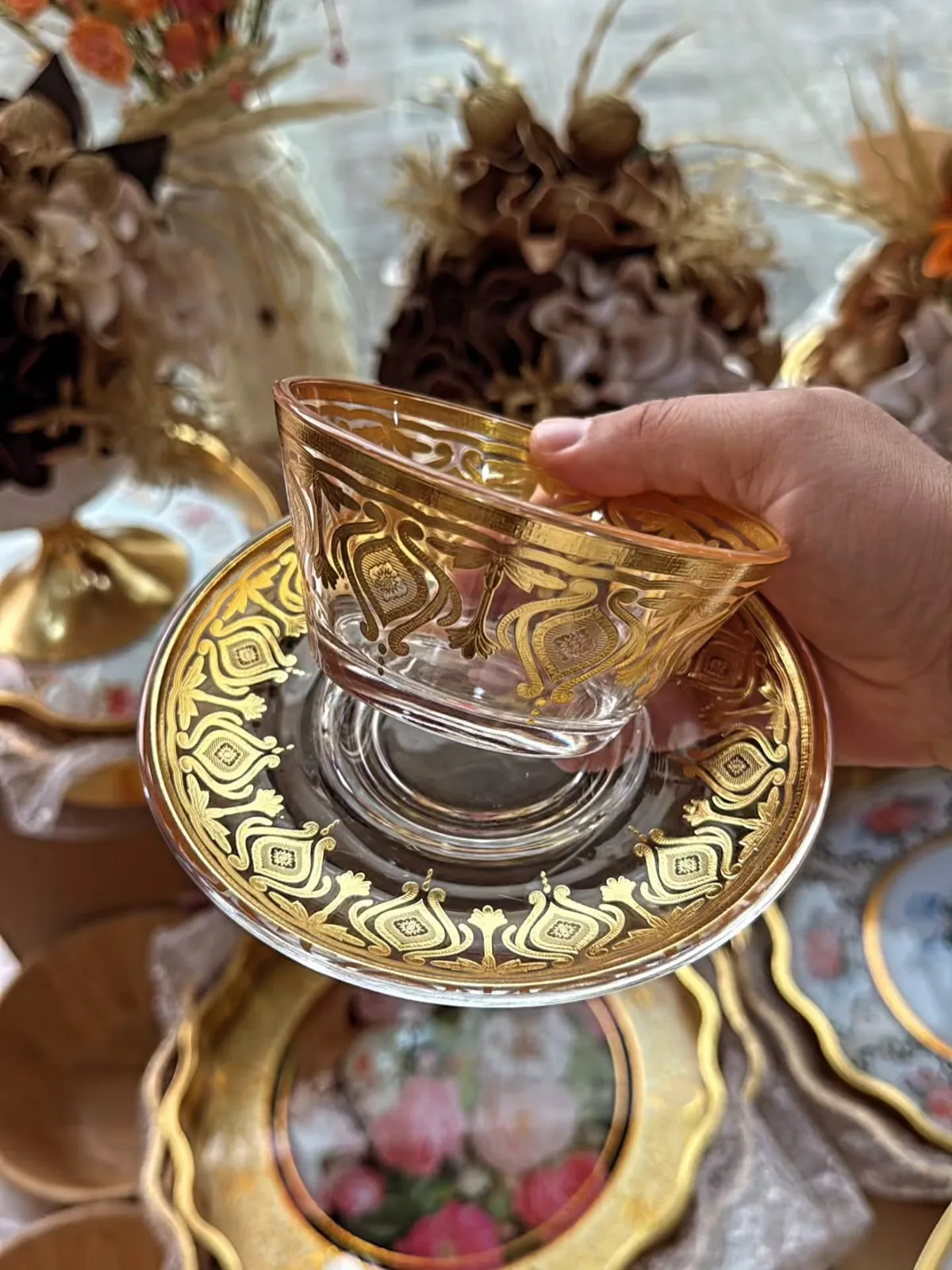 Gold Ornamented Glass Cup and Saucer Set