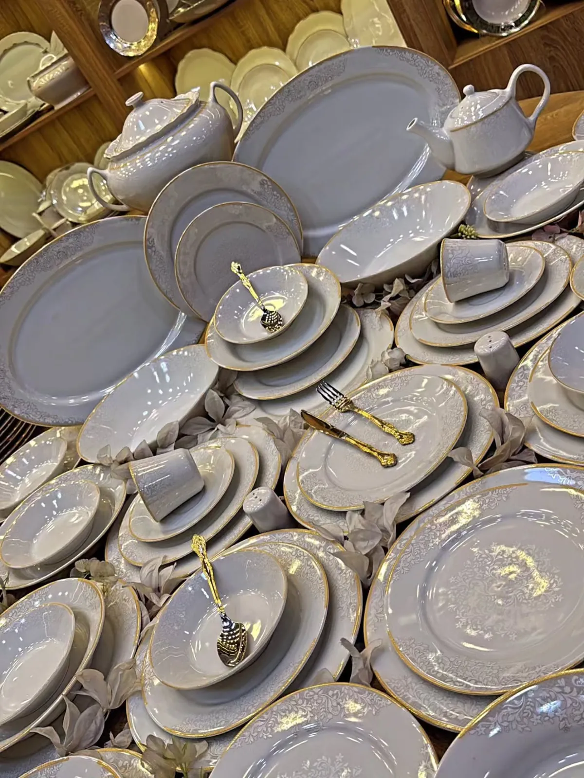 Elegant White Dinnerware Set with Gold Trim
