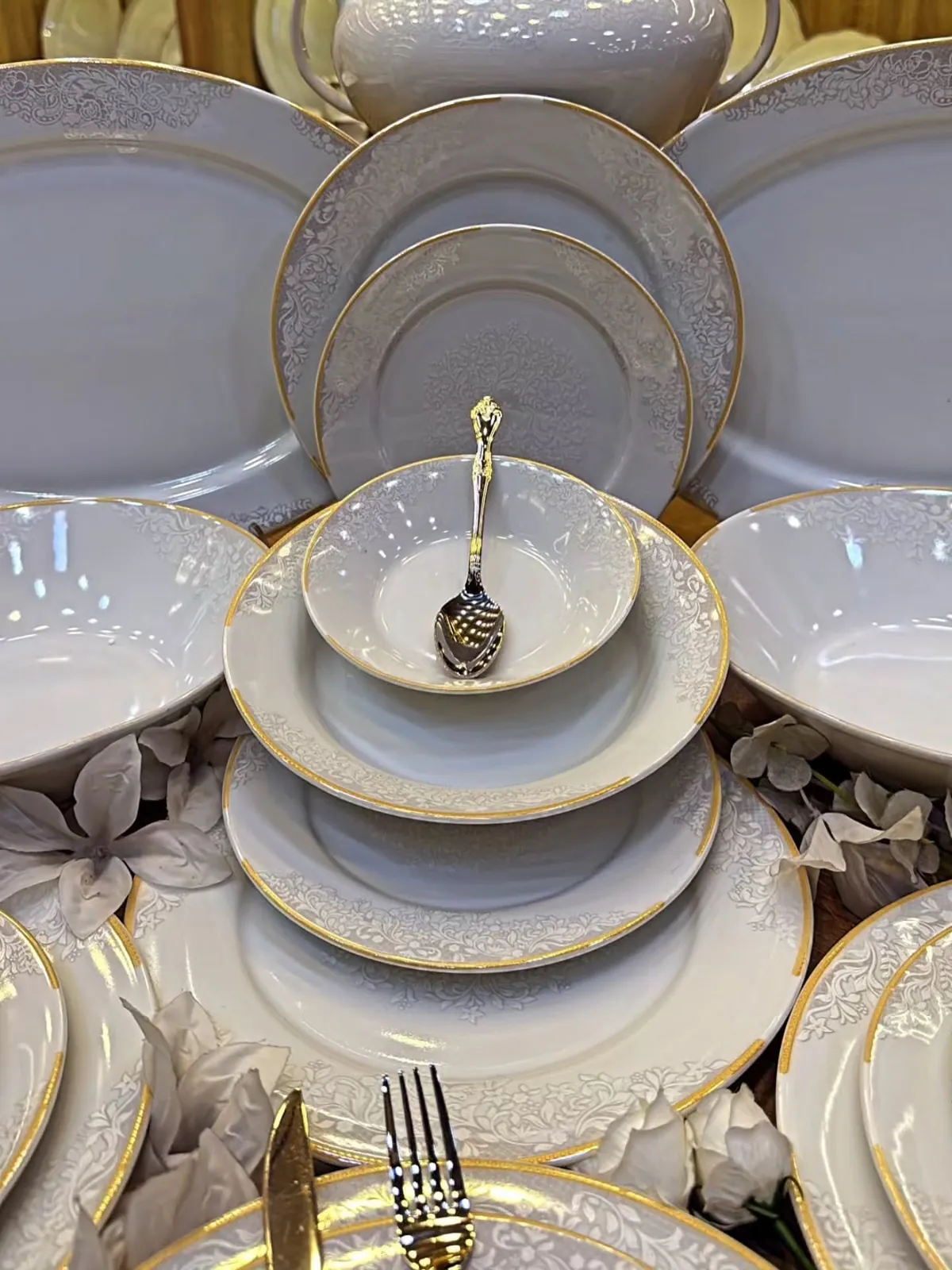 Elegant White Dinnerware Set with Gold Trim