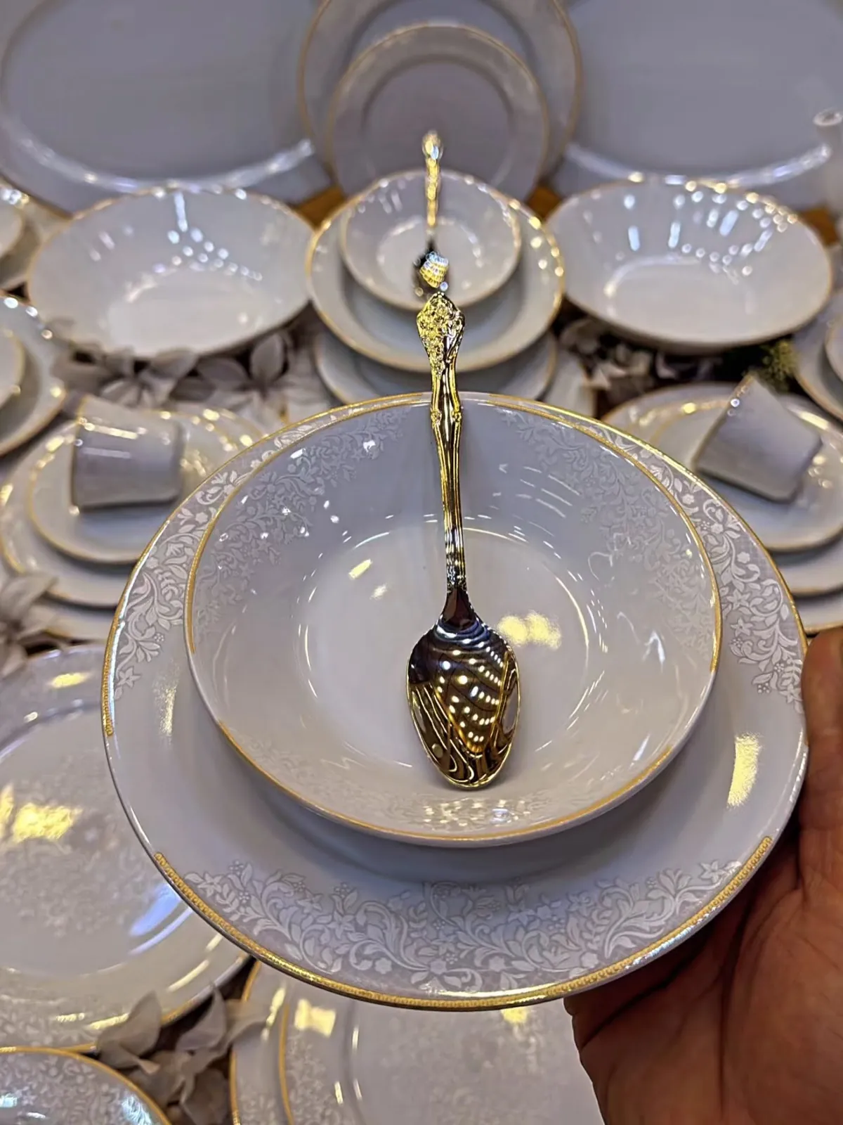 Elegant White Dinnerware Set with Gold Trim