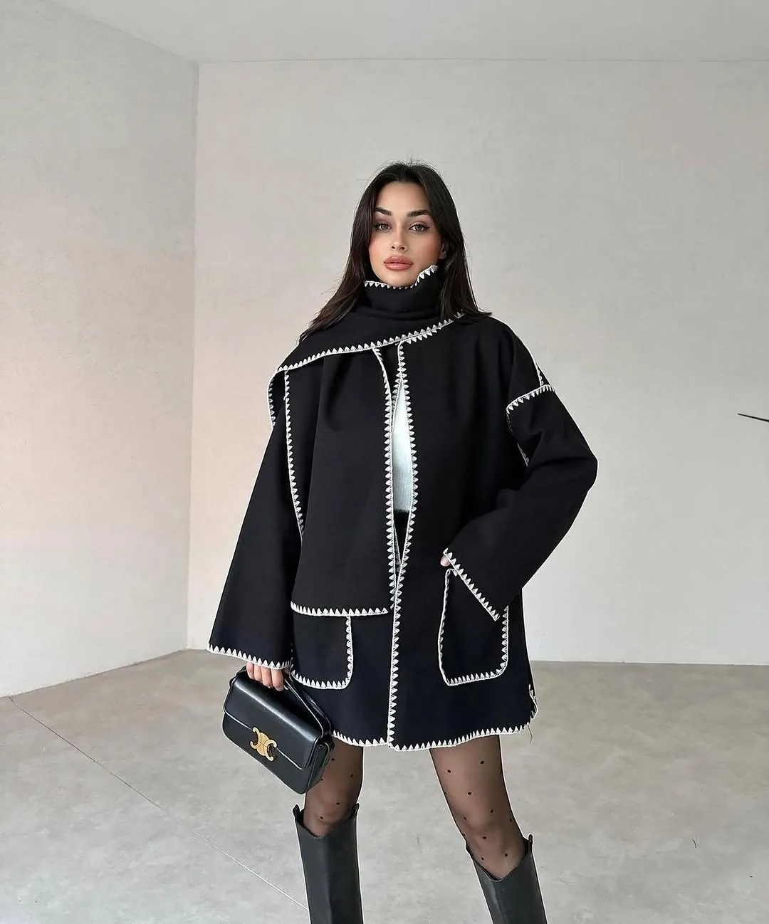 Black Coat with White Stitching