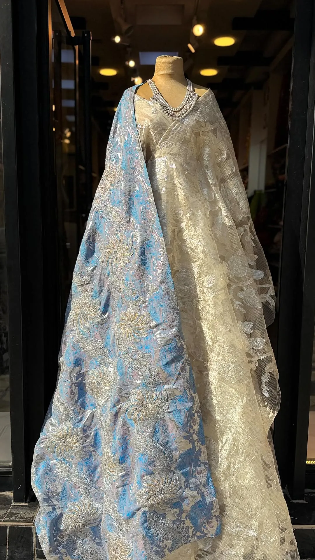 Elegant White Lace Dress with Blue Embroidered Shawl