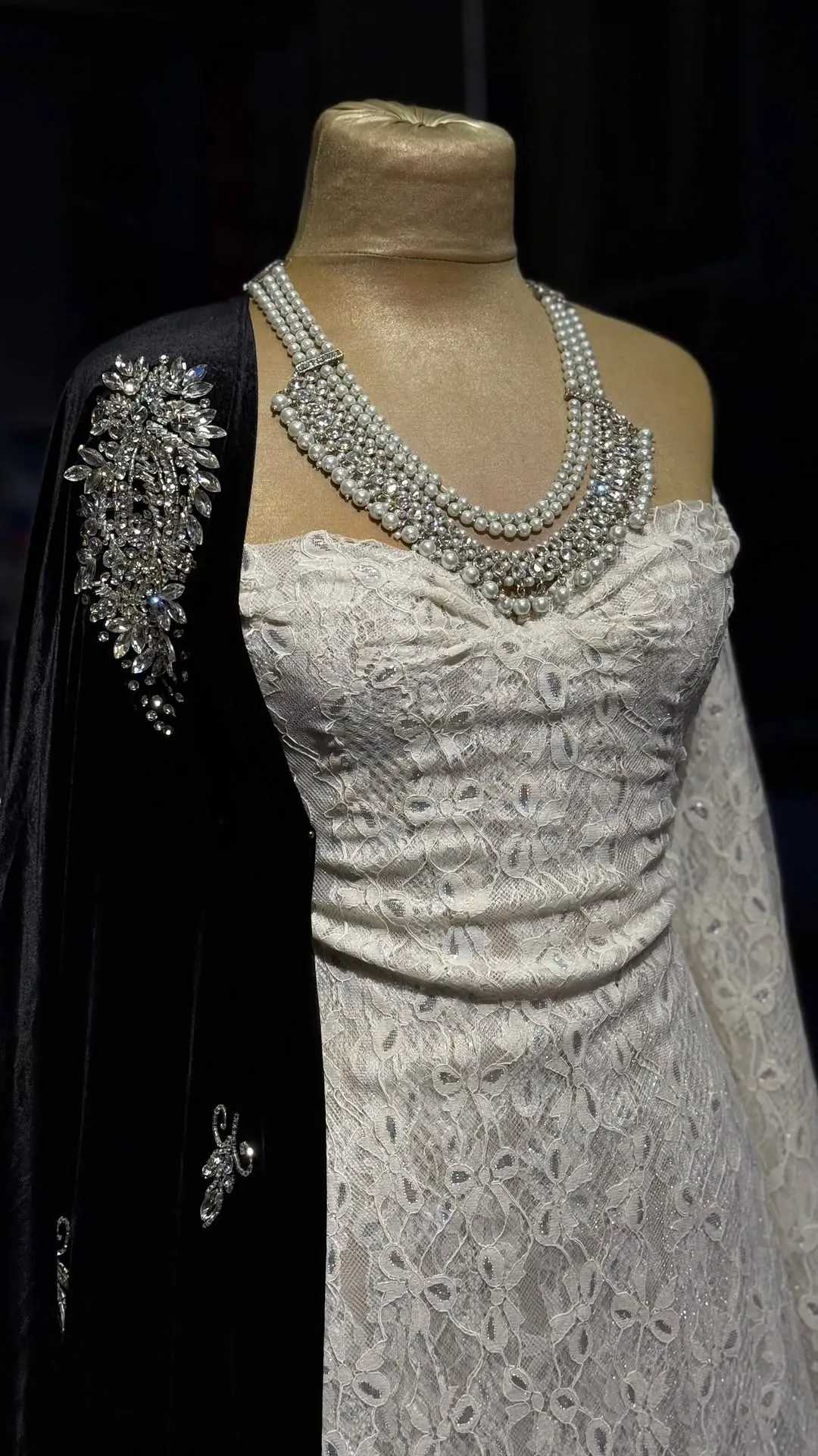 White Lace Wedding Dress with Black Velvet Shawl and Pearl Necklace