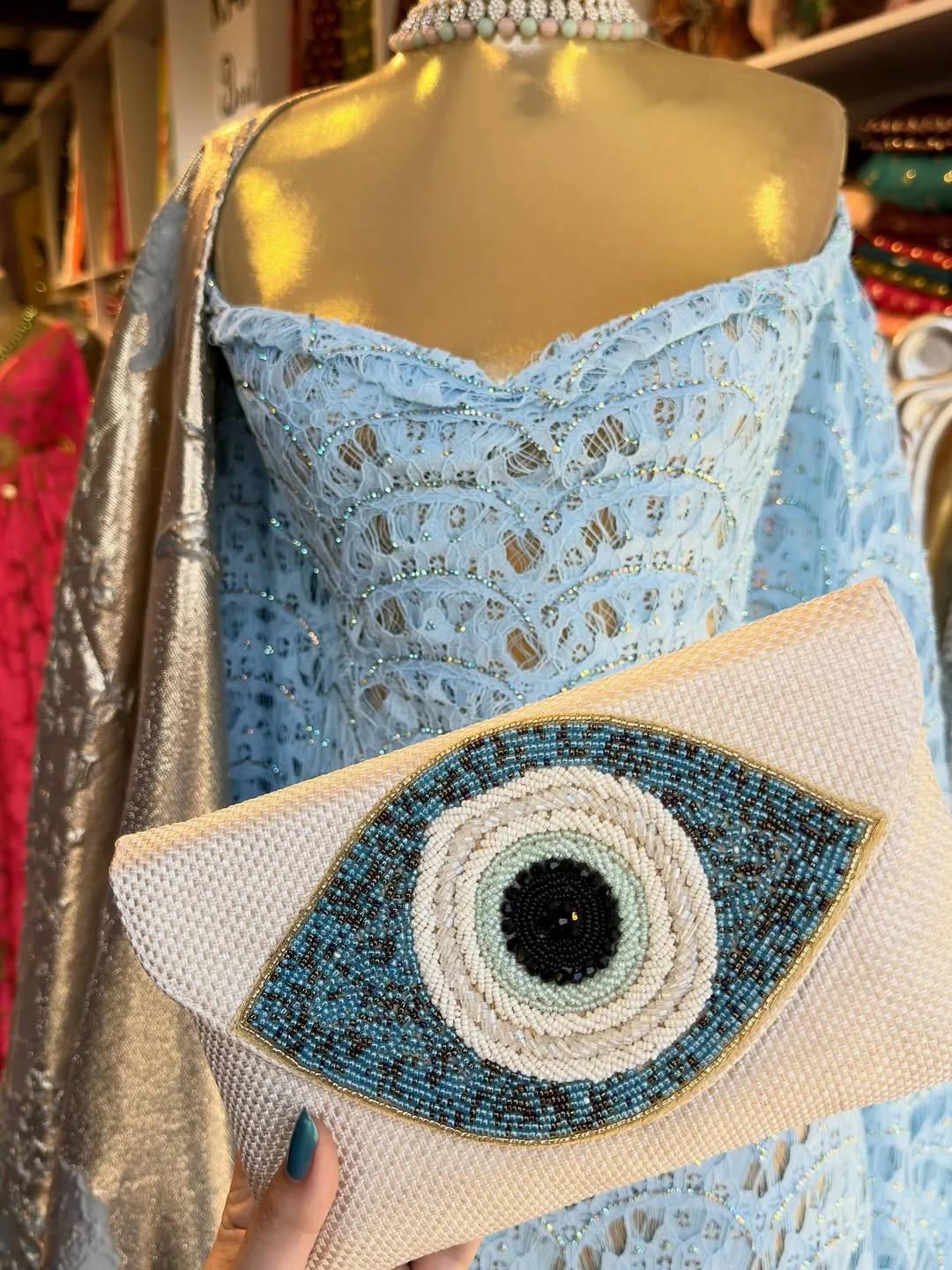 Blue Lace Dress and Beaded Evil Eye Clutch Bag