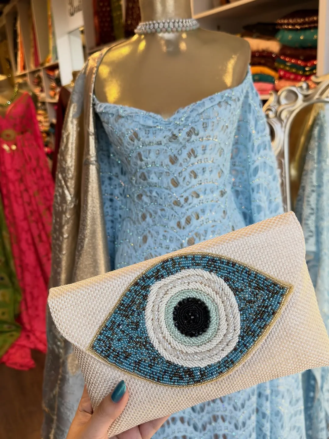Blue Lace Dress and Beaded Evil Eye Clutch Bag
