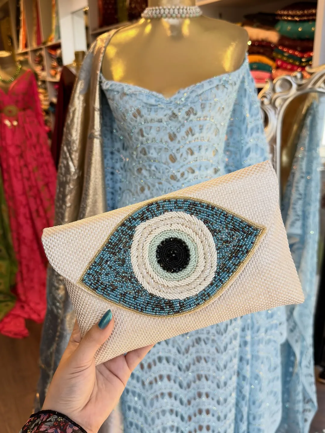 Blue Lace Dress and Beaded Evil Eye Clutch Bag