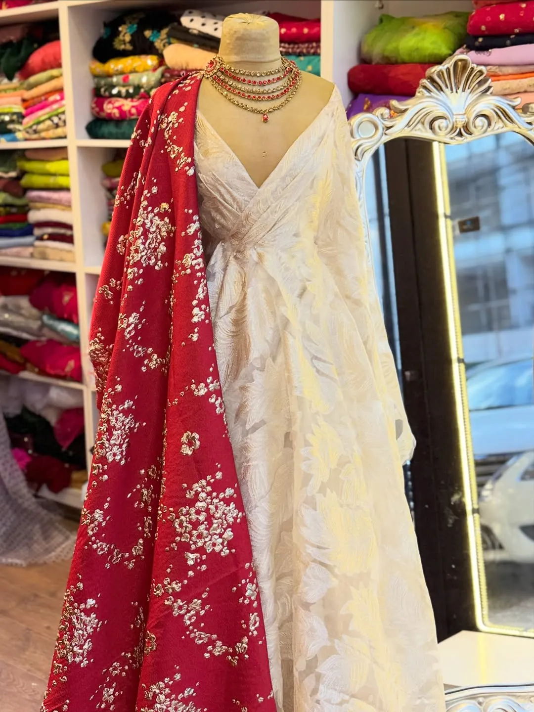 White Traditional Dress with Red Embroidered Shawl and Gold Necklace