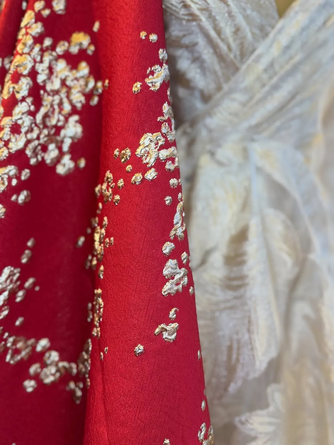 White Traditional Dress with Red Embroidered Shawl and Gold Necklace