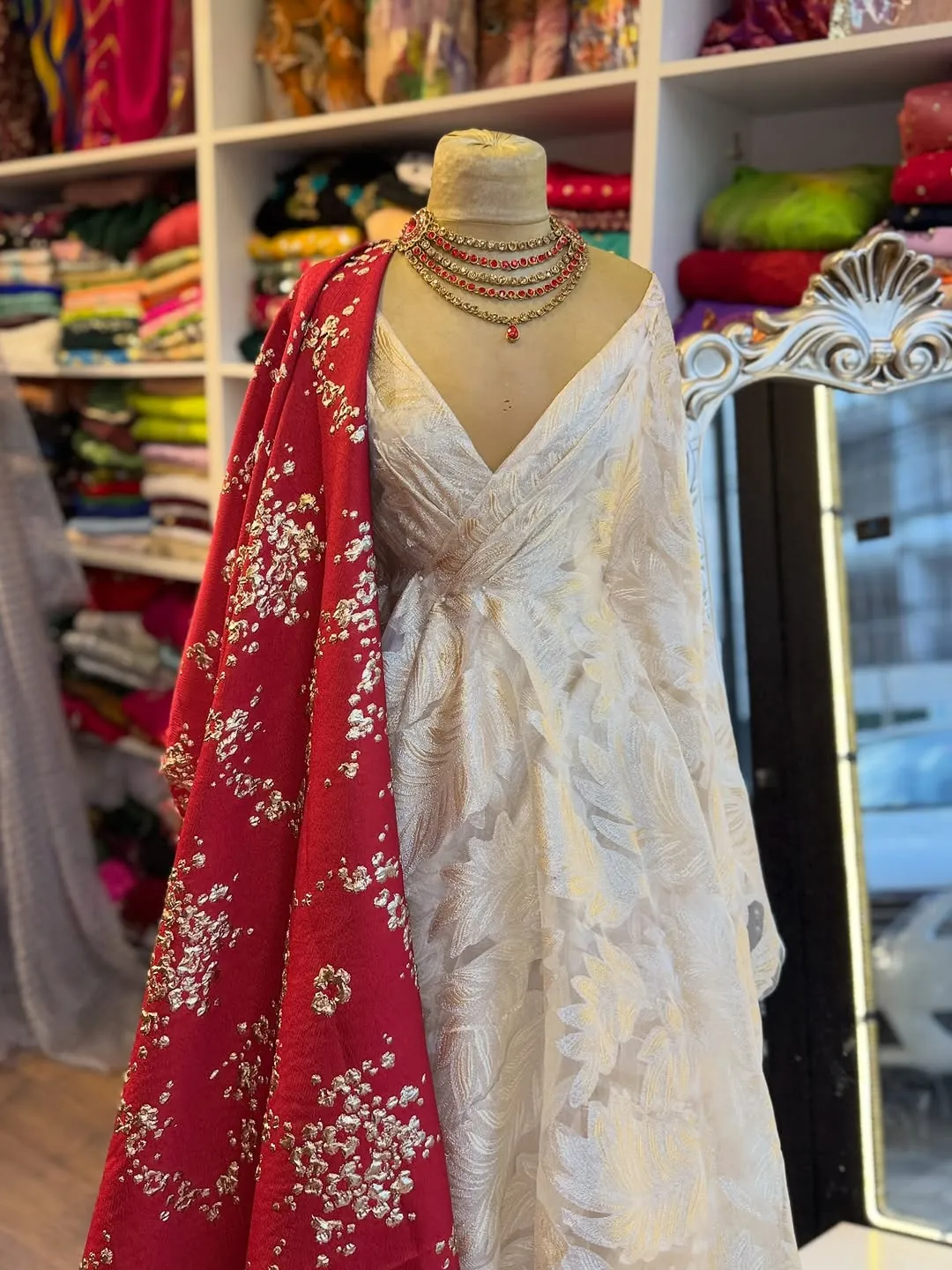 White Traditional Dress with Red Embroidered Shawl and Gold Necklace