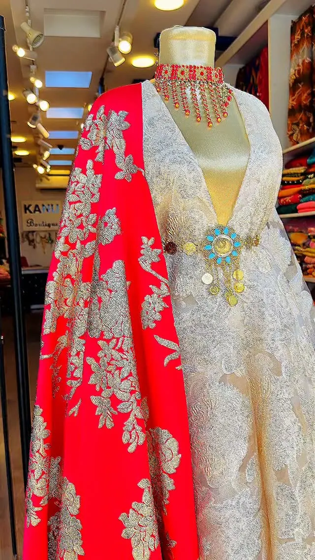 Traditional Embroidered Dress with Red Cape