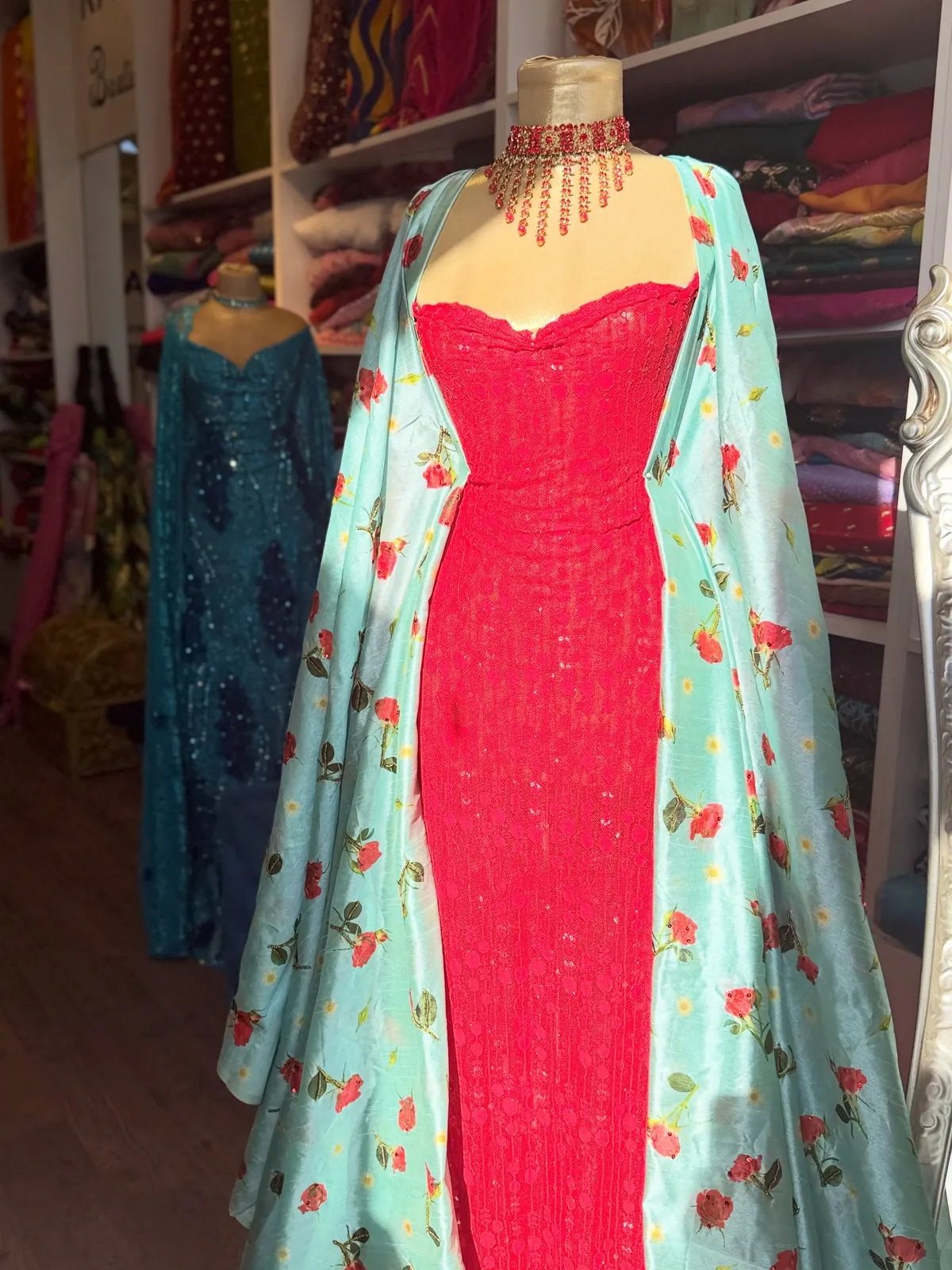 Red Gown with Floral Cape