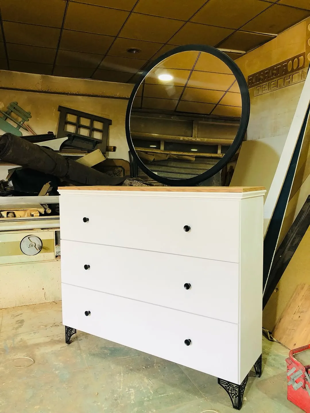 White Three-Drawer Dresser with Round Mirror