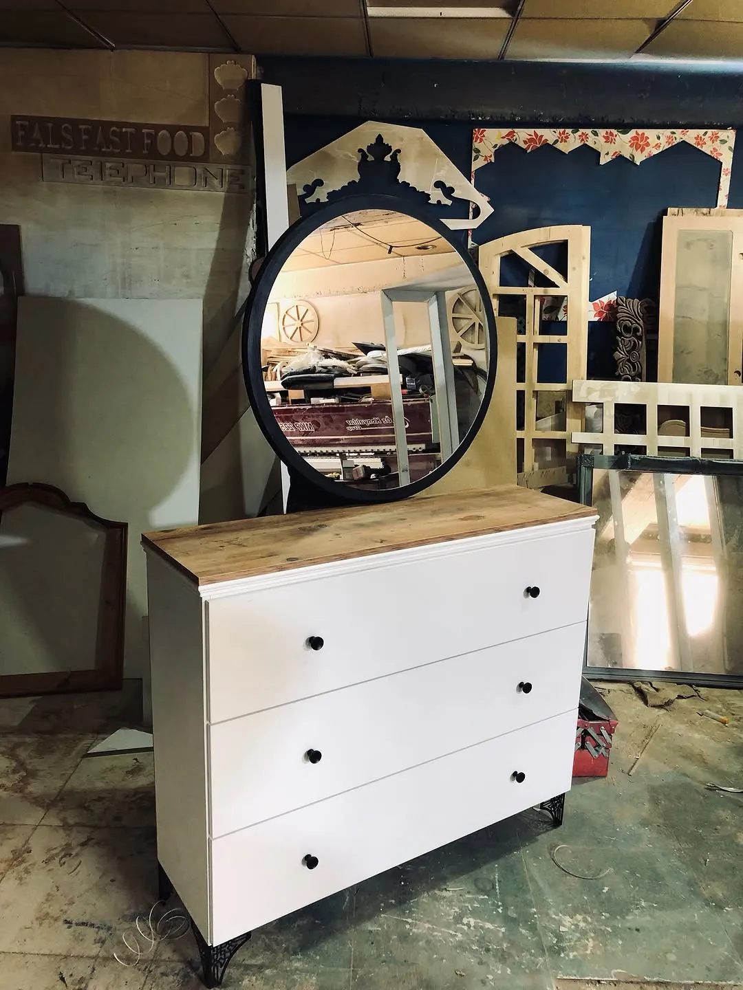 White Three-Drawer Dresser with Round Mirror