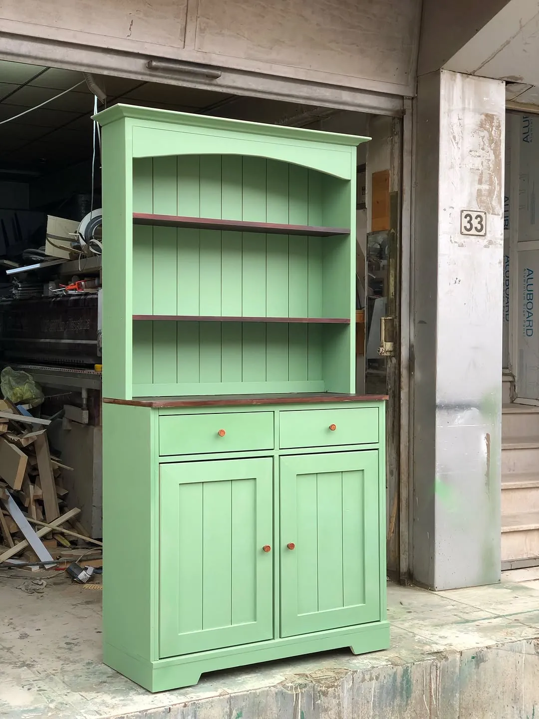 Green Wooden Cabinet with Shelves