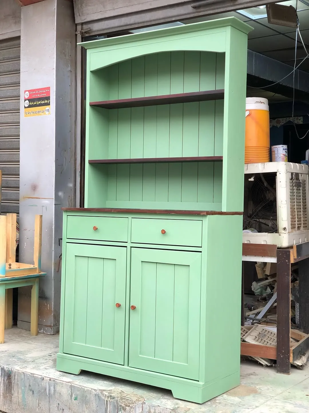 Green Wooden Cabinet with Shelves